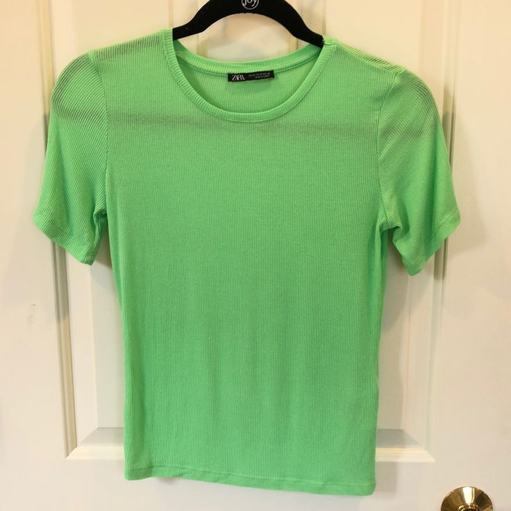 Super Comfy And Super Cute Zara Tshirt In A Vibrant Green! Never Worn! Excellent Condition! Great For The Spring And Summer While Neon Is Trending! Fits More Like A S To M. Green Crew Neck Knit Top, Zara Basic Stretch T-shirt, Green Basic Scoop Neck T-shirt, Basic Green Scoop Neck T-shirt, Green Scoop Neck Basic T-shirt, Basic Green Scoop Neck Tops, Green Fitted Casual T-shirt, Casual Fitted Green T-shirt, Zara Stretch T-shirt For Summer