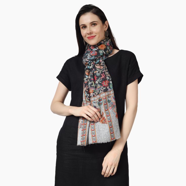 Elevate your style with the Kashmiri Kalamkari Wrap in Black, a unique hand painted scarf crafted from luxurious Merino wool. Experience the beauty of traditional kalamkari art with this must-have accessory. 100% Fine Merino Wool Hand Aari Work Embroidery Outing Kalamkari wraps are hand painted and augmented with intricate hand embroidery on the print of the wrap. One Size: 28 Inch (Width) X 80 Inch (Length) | (71 cm X 203 cm) Ideal & Elegant gift Choice! solve your gifting worries today with so Traditional Multicolor Scarves For Winter, Traditional Multicolor Winter Scarf, Multicolor Silk Scarf With Traditional Patterns, Traditional Multicolor Winter Scarves, Traditional Festive Winter Scarves, Traditional Winter Festive Scarves, Traditional Jamawar Scarves For Winter, Festive Pashmina Scarves With Traditional Patterns, Traditional Patterned Scarves For Eid