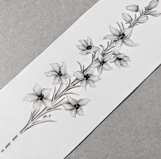 a drawing of some flowers on a white piece of paper with black and gray ink