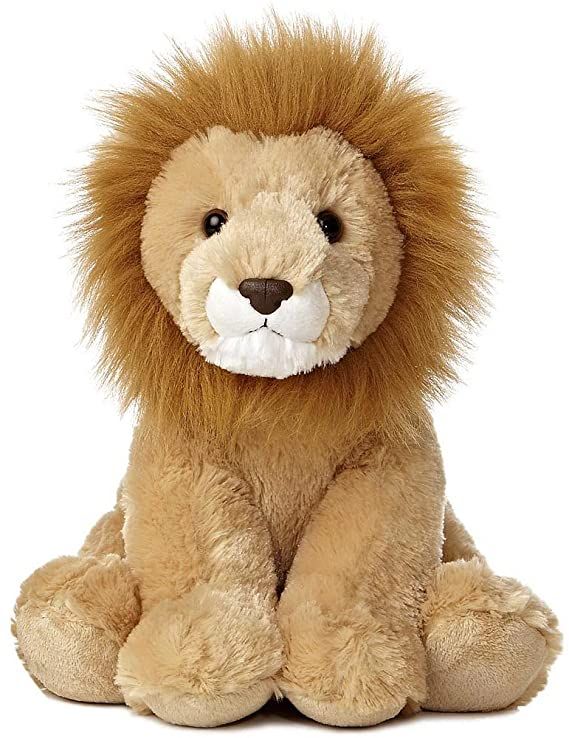 a stuffed lion sitting on the ground