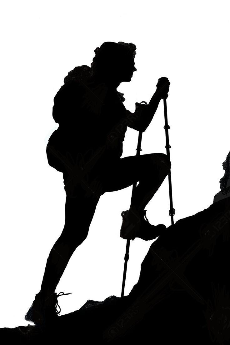 the silhouette of a hiker climbing up a mountain with his trekking poles in hand