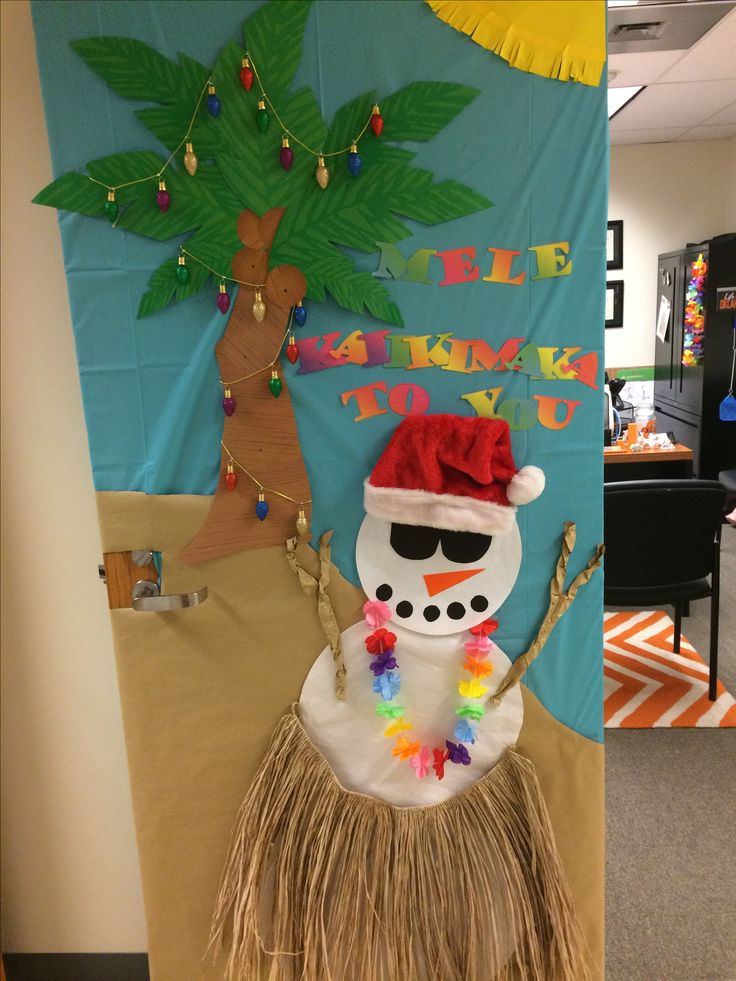 a bulletin board with a snowman wearing a hula skirt and a palm tree