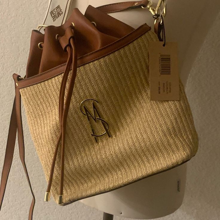 Nwt Steve Madden Crossbody Bag Casual Crossbody Bag With Gold-tone Hardware, Casual Crossbody Bucket Bag With Gold-tone Hardware, Casual Bucket Shoulder Bag With Gold-tone Hardware, Tan Crossbody Bucket Bag With Removable Pouch, Chic Tan Crossbody Bucket Bag, Casual Tan Bags With Gold-tone Hardware, Tan Bucket Shoulder Bag With Adjustable Strap, Steve Madden Crossbody Bag, Pink Guitar