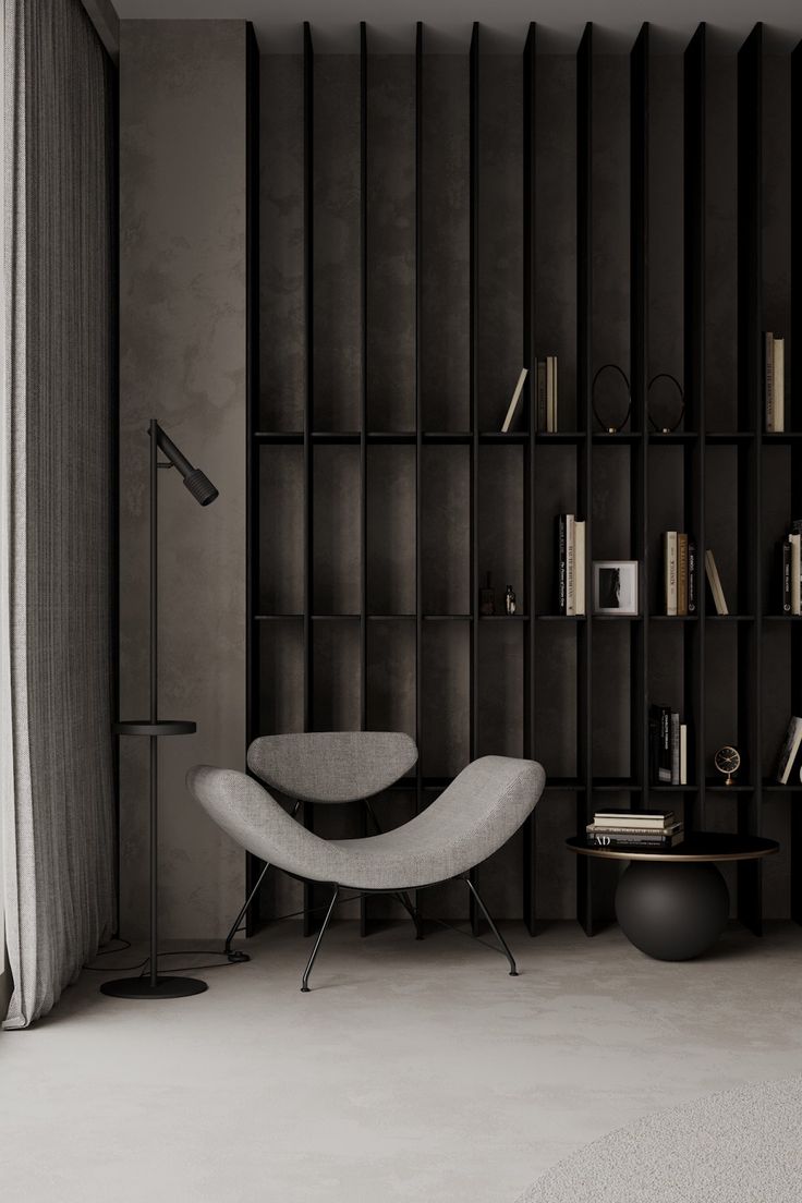 a living room filled with furniture and bookshelves