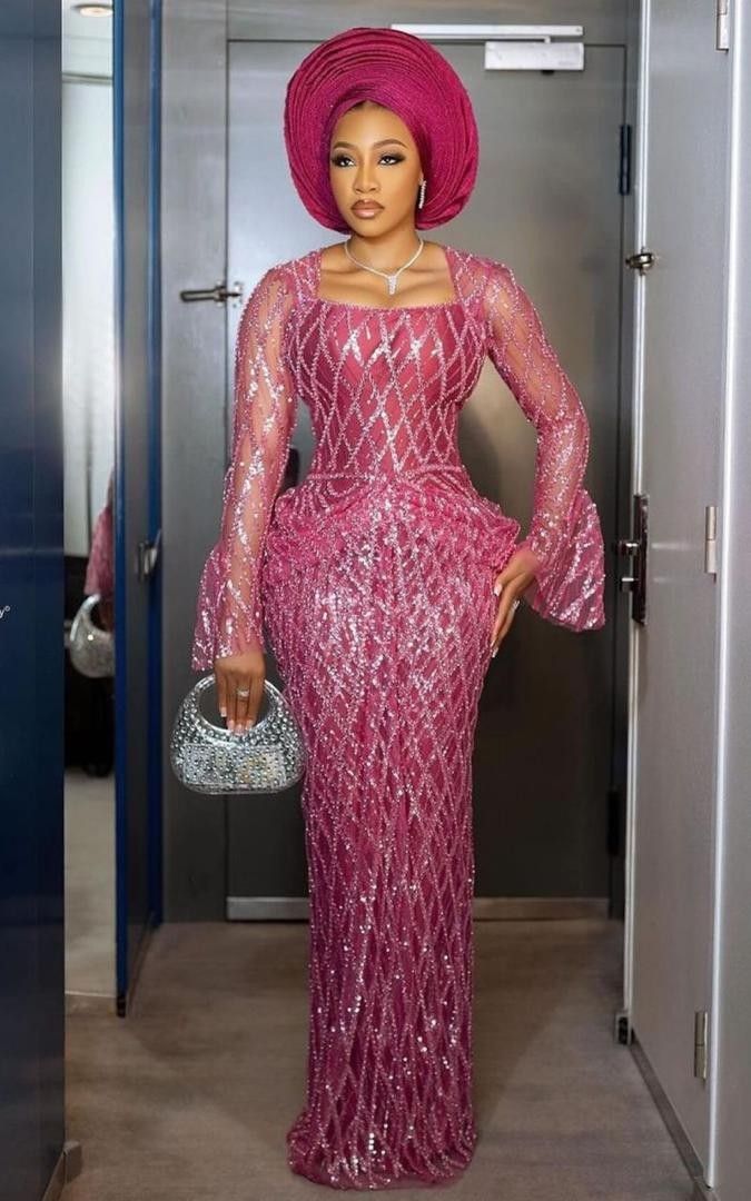 Pink Lace Gown Styles Nigerian, Lace And Satin Combination Styles, Owambe Lace Styles 2024, Pink Lace Asoebi Styles, Aso Ebi Lace Style 2024, Plus Size Asoebi Lace Styles, Trendy Lace Asoebi Styles, Aso Ebi Dress Styles, Latest Lace Gown Styles Aso Ebi