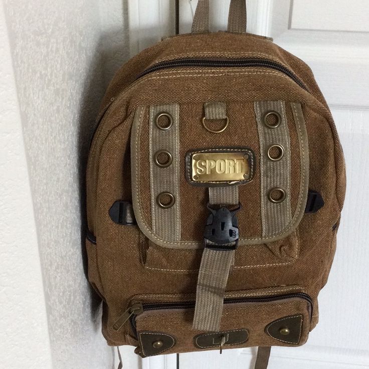 Unisex Tan/Brown Backpack Nwt Made Of Burlap-Type Material. One Pocket On Both Sides And Front Zippered Pocket. Ombr Discoloration On Tag Is Intentional. Beautiful Bag. 16”H X 12”W X 6”D (Or Even Slightly Larger) Casual Brown School Bag, Casual Beige Backpack For Outdoor Activities, Brown Canvas Backpack With Zipper Closure, Brown Backpack With Adjustable Strap For Outdoor Activities, Brown Backpack With Adjustable Strap For Outdoor, Casual Canvas Hiking Bag, Casual Brown Bags For Outdoor, Casual Beige Backpack For Outdoor Use, Casual Khaki Hiking Bag