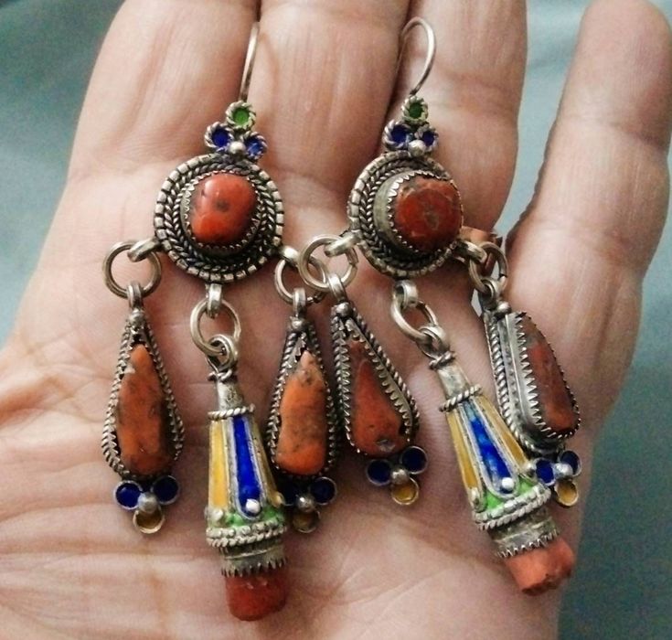 Magnificent Kabyle earrings in sterling silver enamelled with blue, green and yellow color, inlaid with two cabochon of real coral. **Height: 8 cm. **Width: 3 cm. **Material: sterling silver 925, real coral. **Weight: 31.6 grams. **Origin: Grand Kabyle Region 1970s - Algeria. **Shipping: free worldwide by DHL. I am always open to offers for any of my items, so please contact me if you would like to make an offer. Do not hesitate to contact me for any questions. All items advertised for sale are Traditional Multicolor Sterling Silver Earrings, Bohemian Pendant Earrings For Festivals, Bohemian Multicolor Pendant Earrings, Bohemian Multicolor Enamel Earrings, Multicolor Enamel Jewelry, Traditional Multicolor Nickel-free Jewelry, Multicolor Pendant Earrings For Festivals, Ornate Handmade Turquoise Jewelry, Nickel-free Bohemian Enamel Earrings