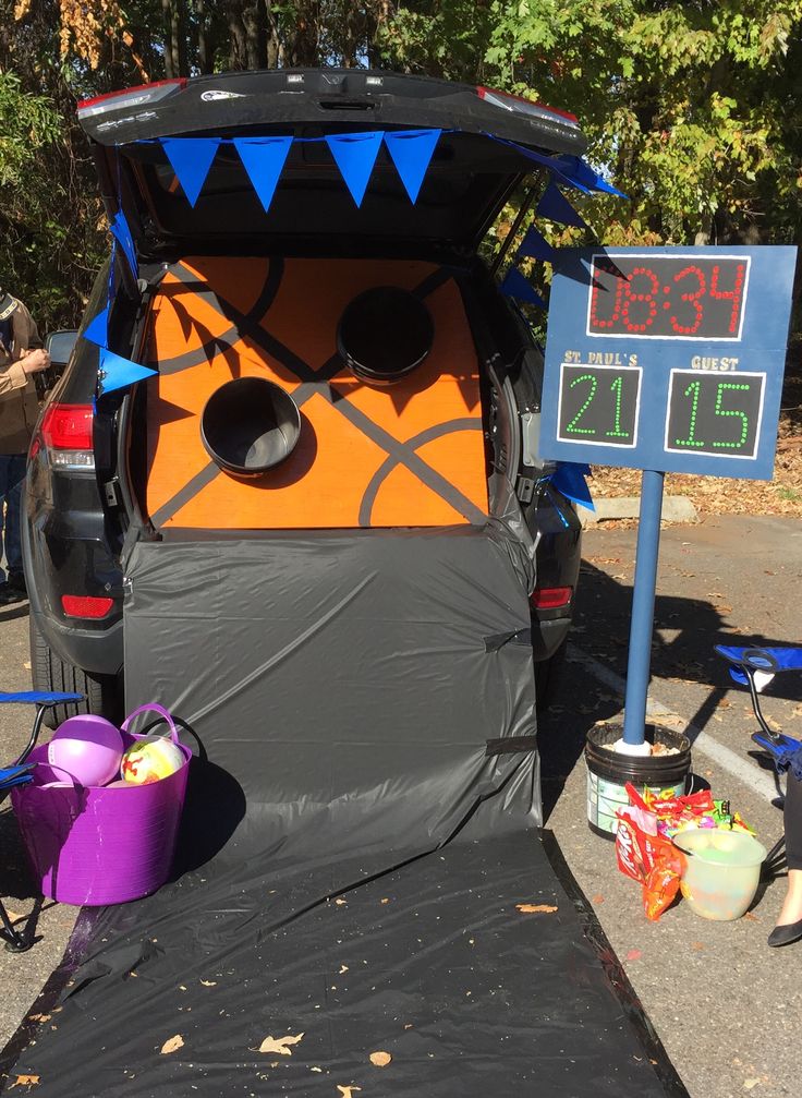 the trunk of a car is decorated to look like a monster