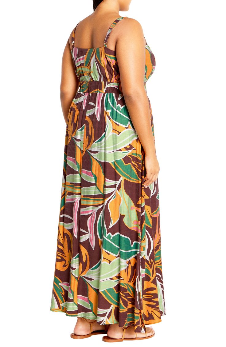 Complete your vacation packing with a lightweight maxi sassed with a center cutout and covered in showy blooms. 50" center back length (size X-Small) V-neck Adjustable straps Side-seam pockets Lined 80% viscose, 20% nylon Hand wash, dry flat Imported Flowy Tropical Print Maxi Dress, Brown Floral Print Maxi Dress For Vacation, Brown Maxi Dress For Beach, Vacation Maxi Dress With Tropical Print, Green Floral Print Maxi Dress For Vacation, Brown Maxi Dress For Vacation, Tropical Flowy Maxi Dress, Tropical Maxi Dress With Floral Print For Day Out, Flowy Maxi Dress With Tropical Print