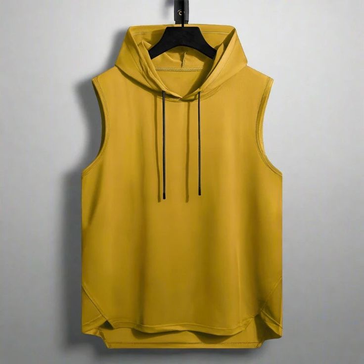 Level Up Your Workout Gear: Quick-Dry Sleeveless Hoodie Take your workouts to the next level with this functional and stylish sleeveless hoodie. Featuring a quick-dry polyester blend, it keeps you cool and dry during even the most intense activities. Performance-Ready: The quick-dry fabric wicks away moisture and dries fast, keeping you comfortable during exercise. Unrestricted Movement: The sleeveless design allows for full range of motion, perfect for any workout. Hooded Style: The attached ho Yellow Hoodie, Hoodie Green, Sleeveless Hoodie, Active Hoodie, Red Green Yellow, Mens Accessories Fashion, Bahrain, Workout Gear, Kuwait