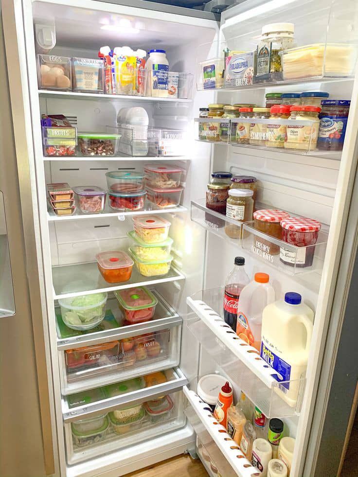 an open refrigerator filled with lots of food