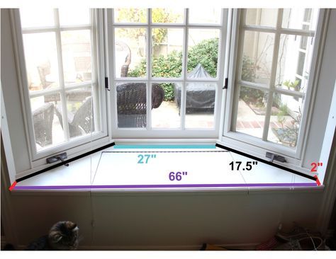 an image of a window with measurements for the size and width in front of it