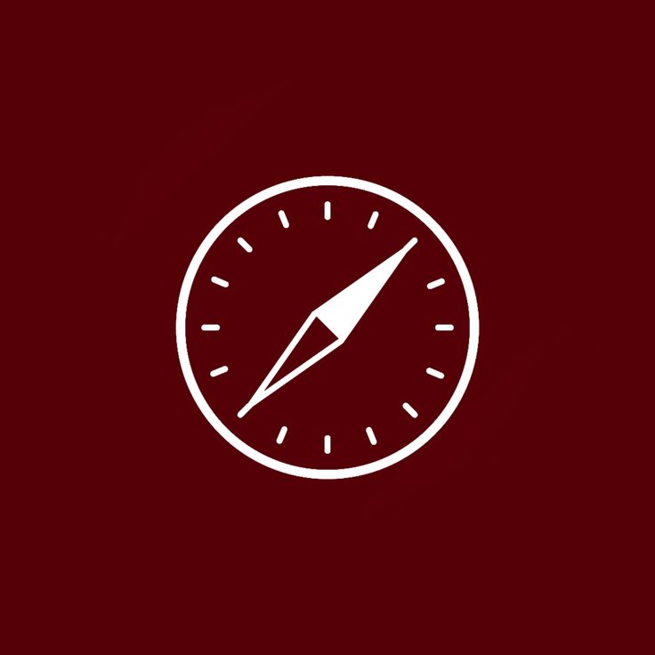 a white compass icon on a red background