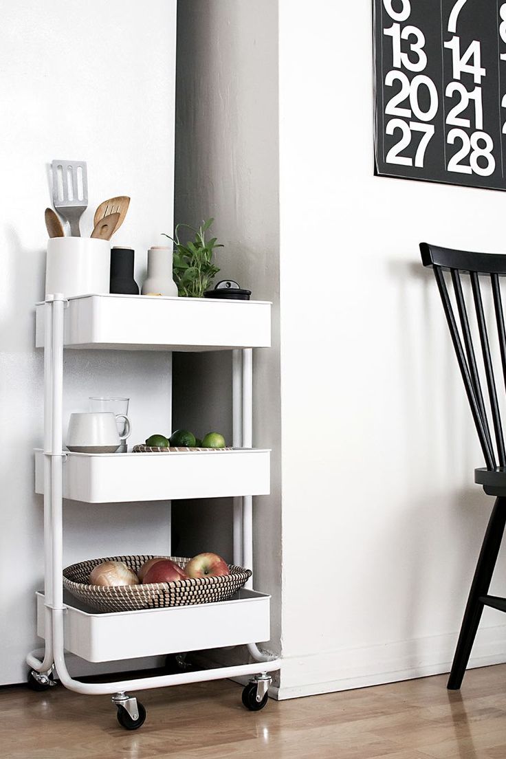 a white shelf with some food on it