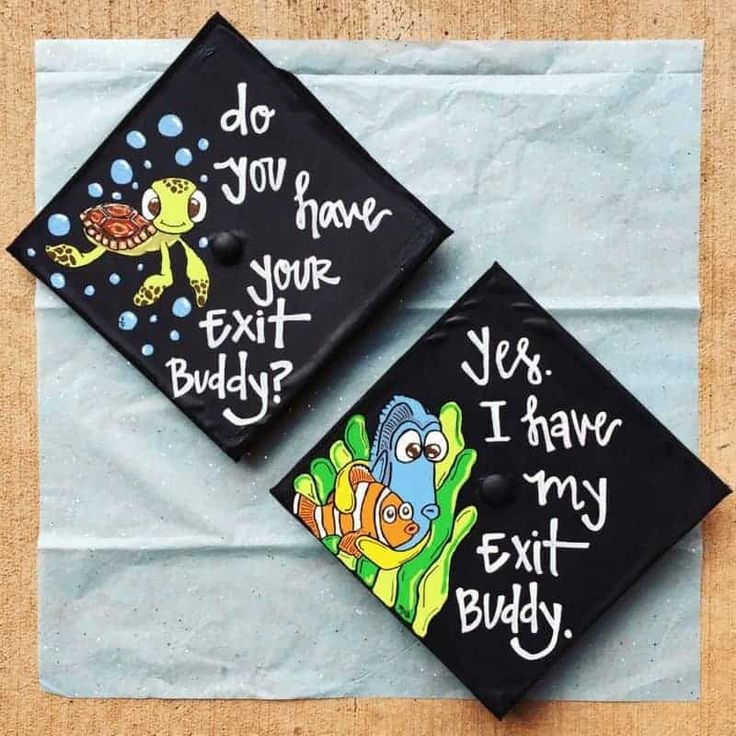 two graduation caps that say do you have your text buddy? and yes i have my exit buddy