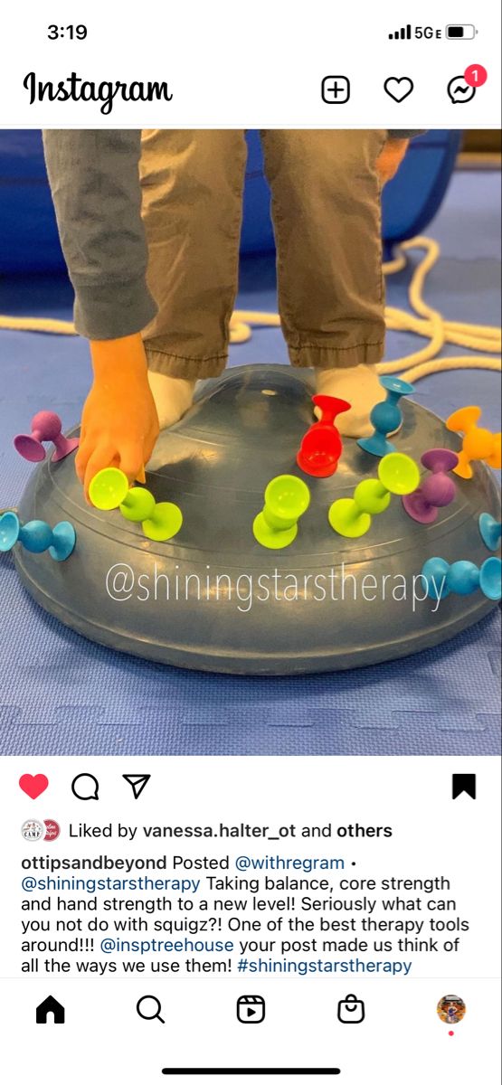 someone is standing on top of an inflatable object with colorful circles and dots