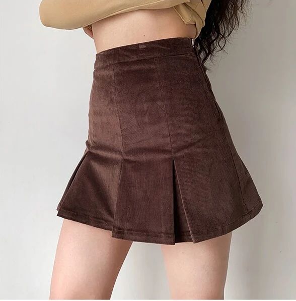 Sexy A-Line Pleated Corduroy Mini Skirt ��– Tomscloth High-waisted Brown Corduroy Skirt, Trendy Brown Skirted Bottoms, Trendy Brown Cotton Mini Skirt, Fall Cotton Skort For School, Fall School Cotton Skort, Fitted Corduroy Mini Skirt With Pockets, Fitted Brown Corduroy Mini Skirt, Fitted High Waist Corduroy Skirt, High Waist Fitted Corduroy Skirt