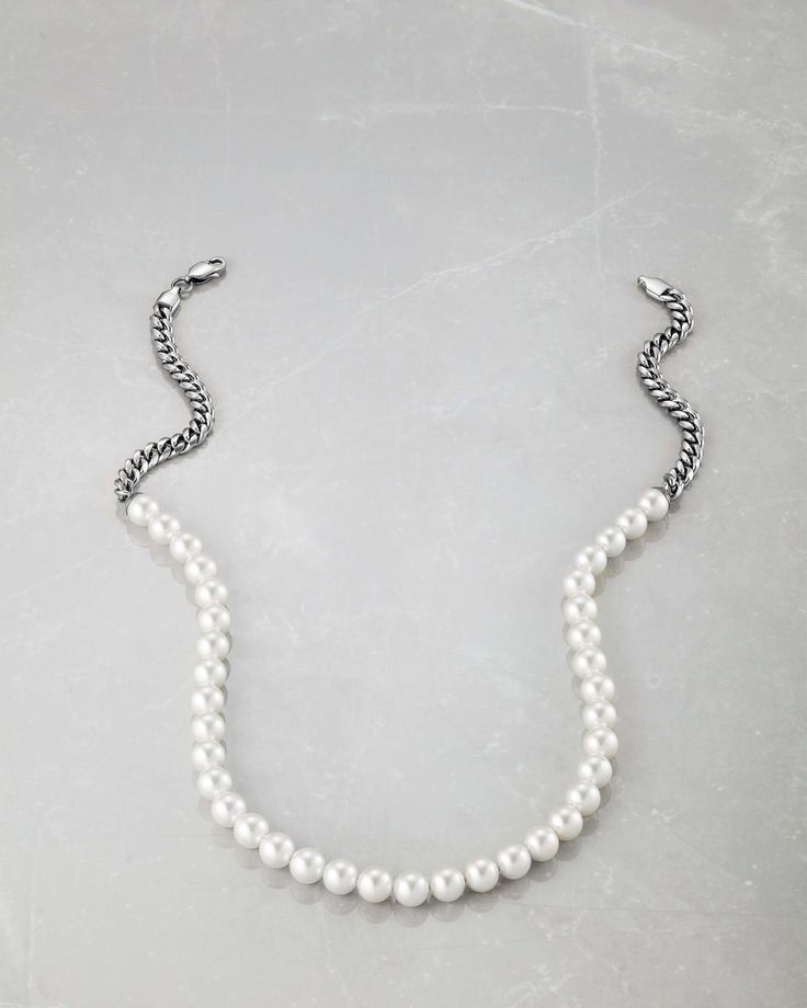 We’ve reimagined our best-selling chain to include the gem people can’t stop talking about. Our silver 8mm Cuban Link Pearl Necklace has over 35 pearls and our classic Cuban links in a 20” length to be worn alone or stacked with a longer chain for the ultimate stack. Classic Pearl Jewelry With Beaded Chain, Classic Sterling Silver Pearl Necklace For Everyday, Classic Chain Necklace With Round Beads, Classic Single Strand Chain Necklace With Round Beads, Classic Single Strand Necklace With Round Beads, Classic Beaded Pearl Necklace, Classic Chain Necklace With Pearl Charm For Formal Occasions, Classic Pearl Necklace With Round Beaded Chain, Classic Formal Chain Necklace With Pearl Charm