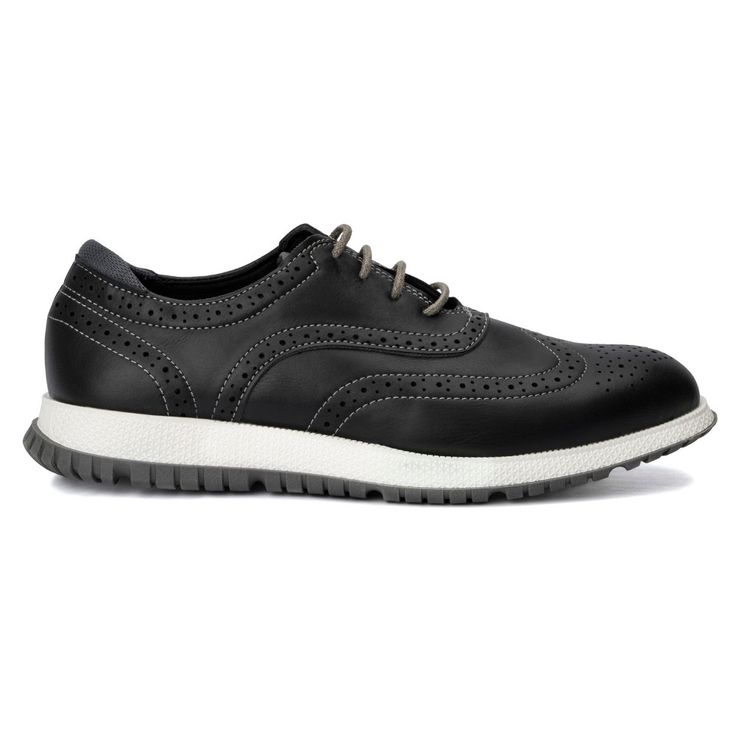 The Wilder shoe combines the comfort of a sneaker with the elegance of a dress shoe. It features intricate brogue detailing, a classic wingtip design, and a lace-up style for a secure fit. Perfect for any occasion, the Wilder shoe ensures you stay stylish and comfortable throughout the day. Whether at work or a special event, step up your fashion game with this versatile and sophisticated footwear. Embrace the best of both worlds with the Wilder shoe. Black Low-top Oxford Lace-up Shoes, Black Low-top Lace-up Shoes, Casual Oxford Wingtip Lace-up Shoes, Casual Wingtip Oxford Lace-up Shoes, Casual Oxford-style Lace-up Wingtip Shoes, Black Wingtip Oxfords With Perforated Toe Box, Casual Black Oxfords With Brogue Detailing, Black Wingtip Lace-up Shoes With Perforated Toe Box, Black Low-top Oxfords With Cushioned Footbed