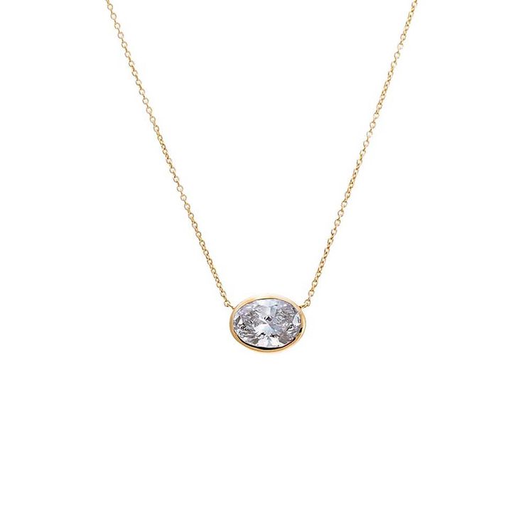 Introducing the Adina Eden Lab Grown Diamond Oval Bezel Necklace, a luxurious and elegant piece crafted from a blend of 14K gold and 14K white gold. This necklace features a stunning oval brilliant-cut lab-grown diamond, with a color grade of G and clarity of VS1, ensuring exceptional brilliance and quality. Available in five different carat weights—0.25CT, 0.50CT, 1CT, 1.5CT, and 2CT—this necklace allows you to choose the perfect size to match your style and preference. The necklace measures 16 Diamond Bezel Necklace, Oval Diamond Necklace, Oval Diamond Pendant, Diamond Anklet, Bezel Necklace, Bold Rings, Gold Cocktail Ring, Oval Pendant, Bezel Diamond