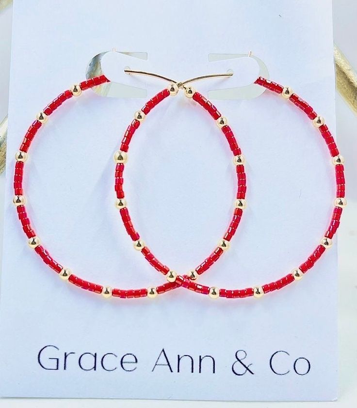 Dainty yet bold, these seed bead hoops are the kind of earrings you'll forget you're wearing - until the next compliment is made, that is.Red miyuki seed beads and 2.5 gold filled beads are hand threaded onto a 14k gold filled 45 mm hoop in a fun-loving design that you'll reach for time and time again. These earrings are hypoallergenic and will not tarnish! Perfect for Alabama, Arkansas game day or any occasion!!  Xoxo,  Shelly Red Hoop Jewelry For Festive Occasions, Gold Beaded Small Hoop Earrings For Summer, Gold Hoop Earrings With Spacer Beads As Gift, Gold Spacer Beads Jewelry For Summer, Gold Hoop Earrings With Spacer Beads For Gift, Adjustable Hoop Earrings With Gold Beads As Gift, Gold Small Hoop Earrings With Tiny Beads, Red Small Hoop Earrings For Summer, Gold Hoop Earrings With Tiny Beads For Summer