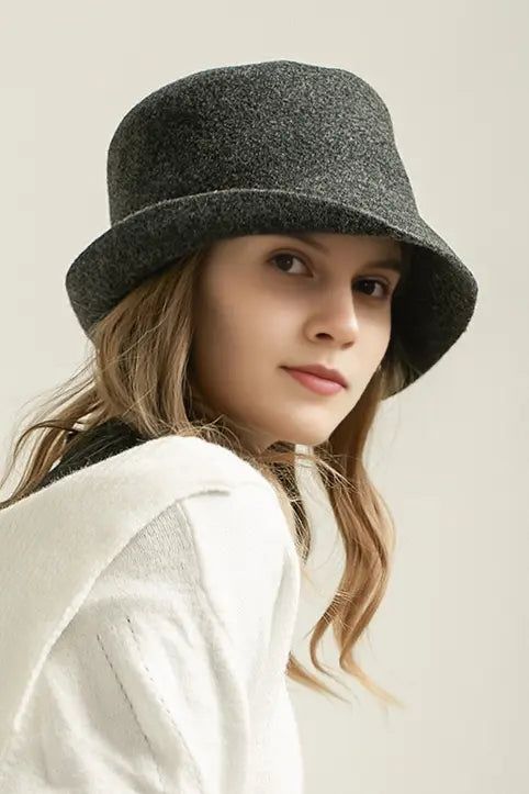 Classic Elegance Meets Modern Comfort in Wool Felt Hat This 100% woolen ladies' hat is an autumn-winter staple, offering exceptional warmth with a touch of sophistication. Featuring a flat crown with a stylish upturned brim, it merges modern fashion with classic aesthetics. Crafted from pure sheep's wool, it provides a comfortable, breathable fit while ensuring excellent insulation. Whether for daily wear or as a statement piece, this cloche hat enhances facial contours, while its cloche hat sty Classic Wool Felt Hat For Winter, Classic Solid Cloche Hat For Fall, Classic Solid Color Cloche Hat For Fall, Classic Fall Cloche Hat, Chic Wool Felt Hat For Fall, Trendy Wool Winter Hat, Trendy Wool Hat For Winter, Trendy Winter Wool Hat, Wool Brimmed Hat For Winter