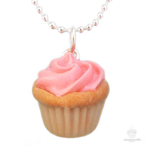 a pink frosted cupcake on a ball chain