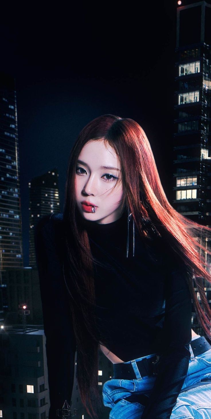 a woman with long red hair sitting on a bed in front of a cityscape