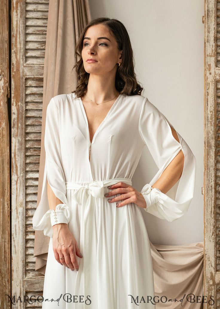 Elegant White Open Front Robe, Flowy Nightgown For Wedding Night, Feminine Wrap Wedding Dress, Flowy Wrap Dress For Wedding, Elegant Open Front Wedding Robe, White Long Sleeve Party Robe, Elegant Wrap Wedding Gown, Elegant Wrap Gown For Wedding, Elegant Wedding Gown With Kimono Sleeves