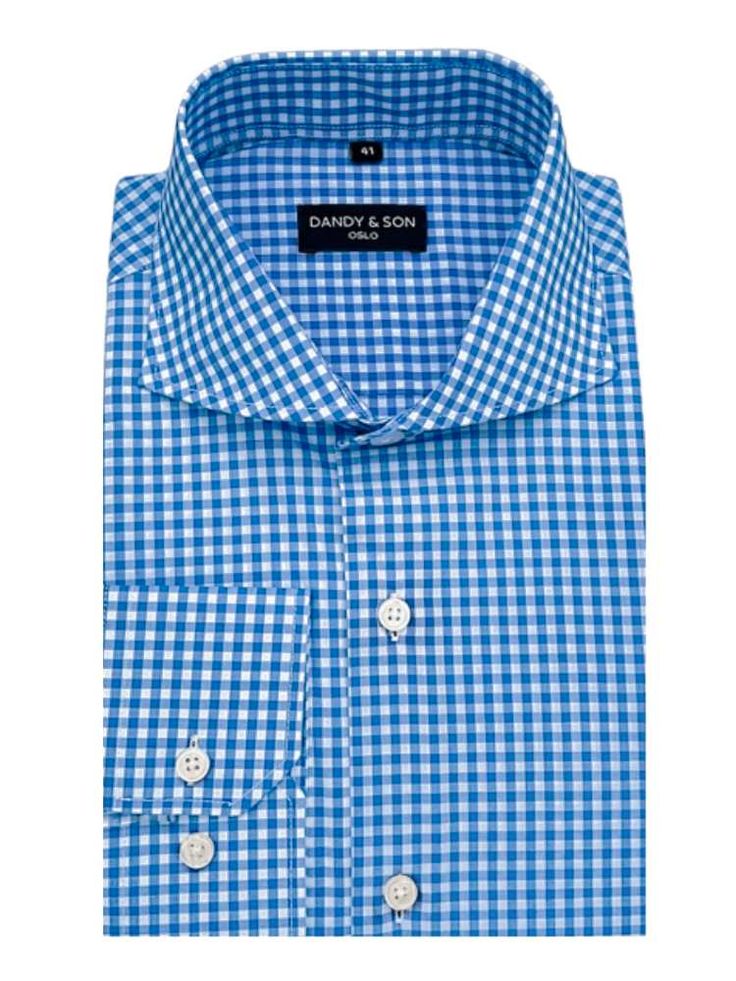 Our Cutaway Blue Gingham Shirt is perfect for introducing a more casual look to your everyday workwear. Crafted from a premium 100% cotton fabric, this shirt is both soft and durable, and features our signature Cutaway Collar for a bold and modern touch. The tailored fit (Dandyfit™) silhouette gives you a sleek and sophisticated look, this shirt is a must-have for any fashion-conscious man. This shirt is versatile and easy to care for with a simple machine washable fabric. Business Gingham Cotton Top, Gingham Button-up Shirt For Business, Plaid Slim Fit Cotton Shirt, Classic Blue Flannel Workwear Shirt, Classic Blue Flannel Shirt For Work, Slim Fit Plaid Cotton Shirt, Classic Gingham Cotton Dress Shirt, Classic Gingham Tops, Gingham Cotton Shirt For Business Casual