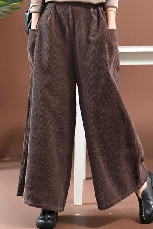 Name:                  Women Loose Corduroy Wide Legs Pants Fabric:                  Fabric has some stretchSeason:                Spring .Fall .Winter Pant Type:            Loose pants Waist Type:          Elastic WaistLength:                 LongCo Brown Ankle-length Winter Pants, Winter Wide Leg Stretch Cotton Pants, Winter Stretch Cotton Wide Leg Pants, Brown Wide Leg Pants With Pockets For Winter, Comfortable Wide Leg Winter Bottoms, Winter Wide Leg Corduroy Bottoms, Comfortable Brown Fall Pants, Winter Corduroy Full Length Bottoms, Winter Full-length Corduroy Bottoms