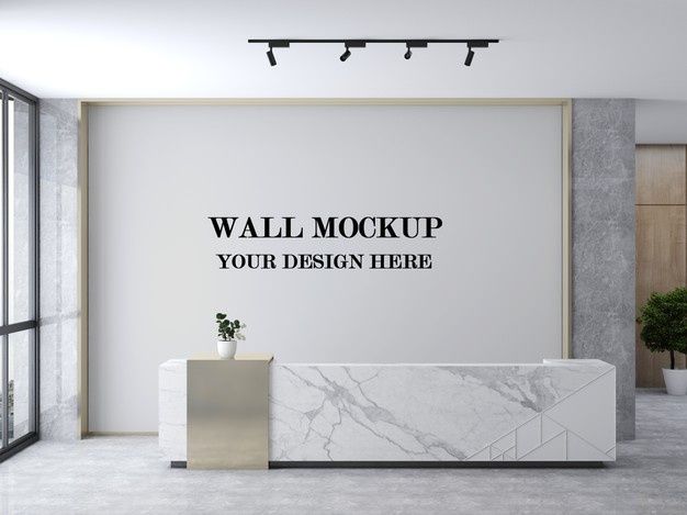 a white marble reception table in front of a wall mockup