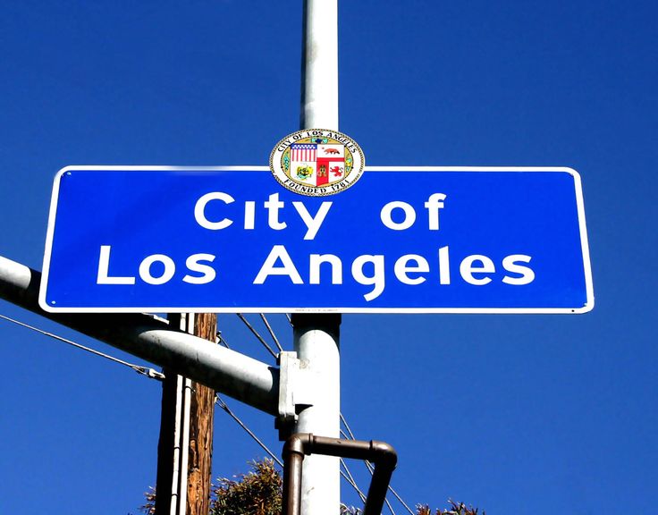 the city of los angeles street sign is clearly visible