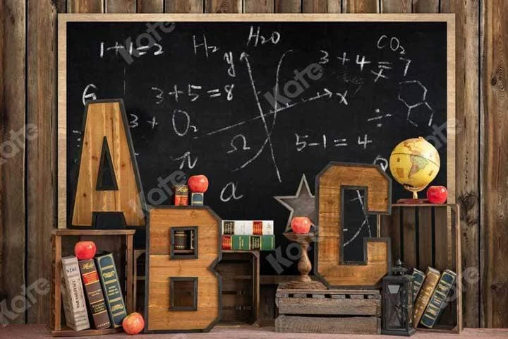 an old school blackboard with the word abc written in chalk and wooden letters on it