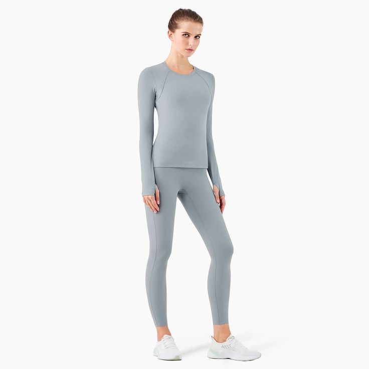 Elevate your workout experience with the Trend4us Fitness Seamless Activewear Set, where style meets functionality. Designed for the active woman who values comfort and sustainability, this set is a blend of high-performance features and fashion-forward aesthetics. Each piece is crafted from a premium blend of 80% Nylon and 20% Spandex, offering a luxurious feel that contours to your body for the ultimate fit. Enjoy the freedom of movement with the four-way stretch material that bends and flexes with you, ensuring a seamless workout from start to finish. The breathable fabric ensures you stay cool and dry, thanks to its quick-dry and sweat-wicking capabilities. Whether you're flowing through a yoga sequence or powering through a high-intensity gym session, this set is designed to keep up w Girls Gym Wear, Support Logo, Yoga Sequence, Yoga Suit, Romper Suit, Suit Swimsuit, Leggings Hoodie, Yoga Activewear, Activewear Sets