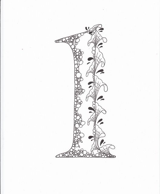 the letter i is decorated with flowers and vines on it's side, in black and white