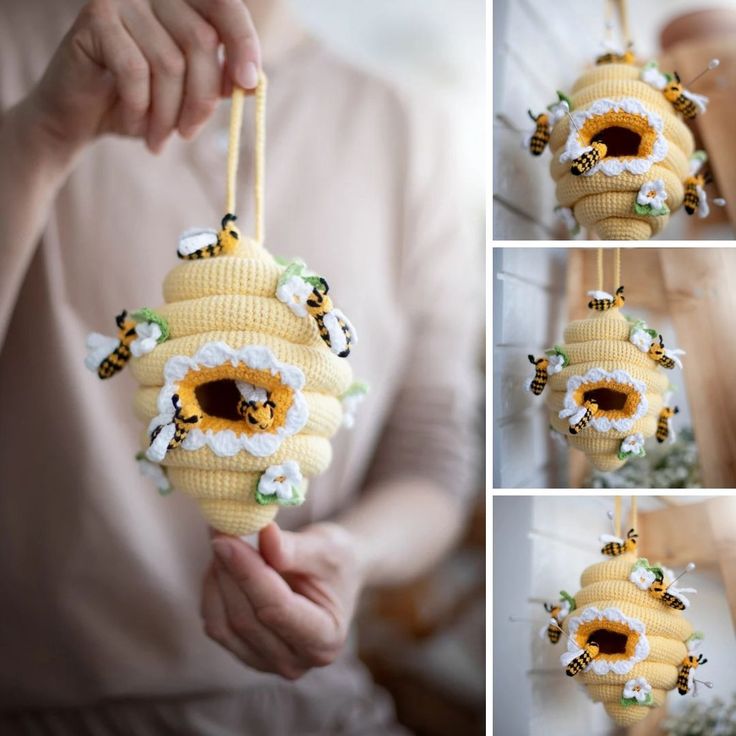 a person holding up a yellow and white sunflower ornament with bees on it