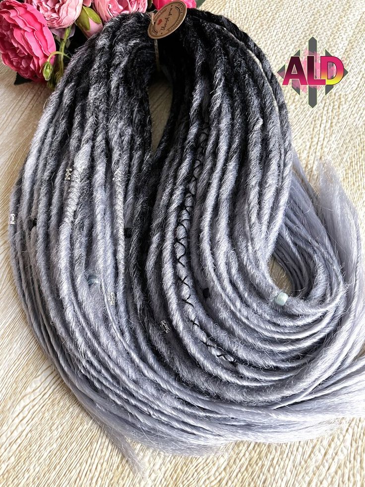 Gray Dreads, Silver Dreads, Grey Dreadlocks Black Women, Grey Dreads Woman, Gray And Black Locs, Black And White Dreadlocks, Grey Hair Color Silver, Synthetic Dreadlocks, Dreadlock Extensions