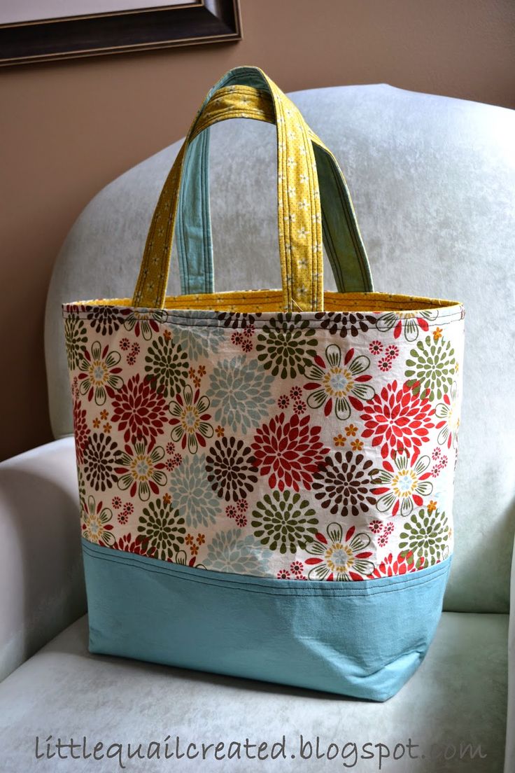 a bag sitting on top of a white chair