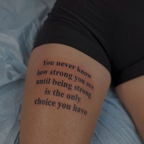 a woman with a tattoo saying you never know how strong you are until being strong is the only choice you have