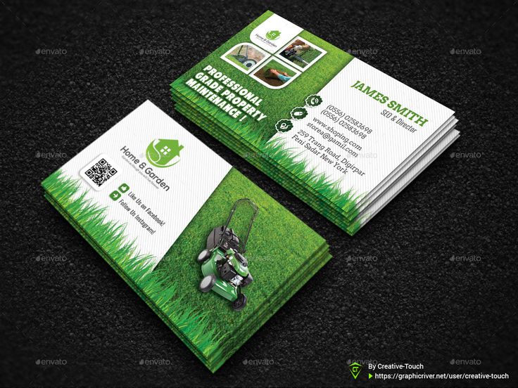 two green business cards with the image of a lawn mower and grass on it