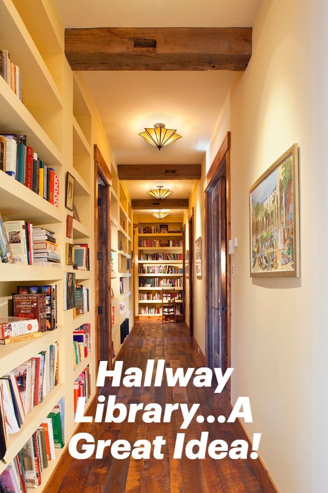 a long hallway with bookshelves filled with books and the words hallway library a great idea