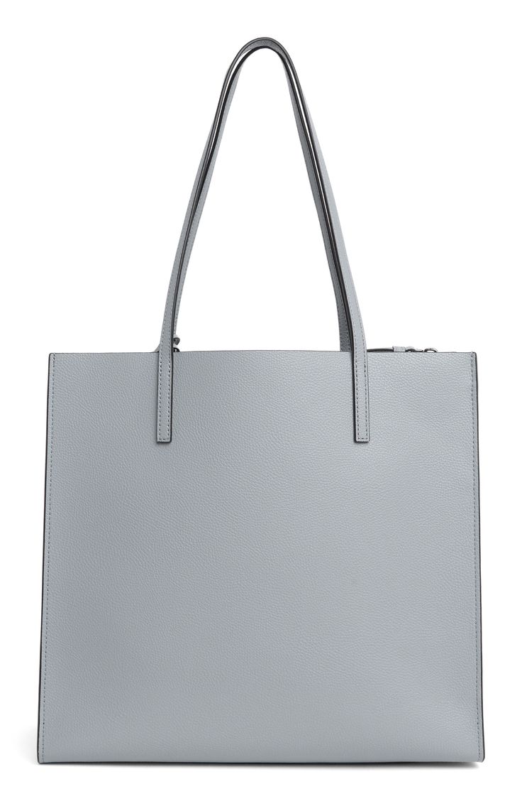 Carry your essentials in this chic pebbled leather tote bag by Marc Jacobs featuring a divider zip pocket to keep things organized. 13.4" L x 12.4" H x 5.7" D 10" strap drop Open top Dual shoulder straps Dual interior compartments with center zip-pocket divider Leather Imported Modern Pebbled Leather Satchel For Shopping, Pebbled Leather Bag With Zipper Closure For On-the-go, Modern Bags With Zipper Closure In Pebbled Leather, Modern Bags In Pebbled Leather With Zipper Closure, Modern Bag With Zipper Closure In Pebbled Leather, Modern Pebbled Leather Bag With Zipper Closure, Rectangular Pebbled Leather Shoulder Bag With Zipper, Everyday Pebbled Leather Bag With Zipper Closure, Pebbled Leather Tote Shoulder Bag With Zipper Closure