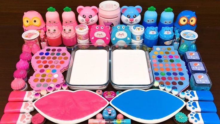 there are many different types of toys on the table with it's trays