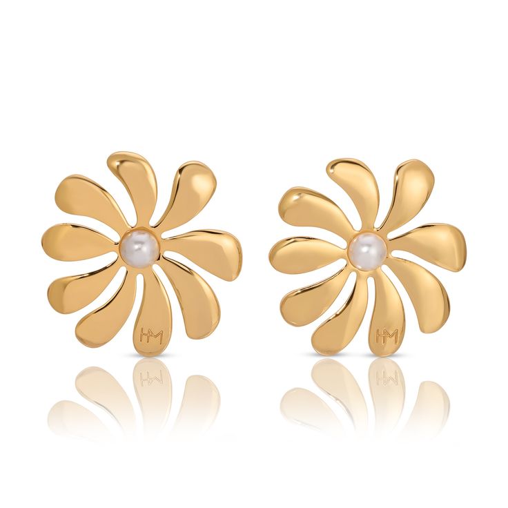 Meet the Floral Earrings - designed with a European vacation on our mind. These statement earrings will elevate even the most laid back summer style. Add the Floral earrings as your perfect piece to transform your summer vacation looks. Please note: these earrings are ultra delicate, so we recommend you to store them delicately, especially for travel. Elegant Flower Shaped Earrings For Beach, Chic Gold Earrings For Vacation, Elegant Gold Earrings For Vacation, Elegant Flower Earrings For Beach, Elegant Single Flower Earring For Summer, Elegant White Flower Earrings For Beach, Elegant Flower-shaped Earrings For Beach, Gold Pearl Earrings For Summer, Yellow Gold Drop Earrings For Summer