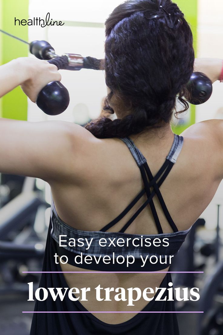 a woman doing exercises with dumbbells in the gym text reads, easy exercises to develop your lower trapezius