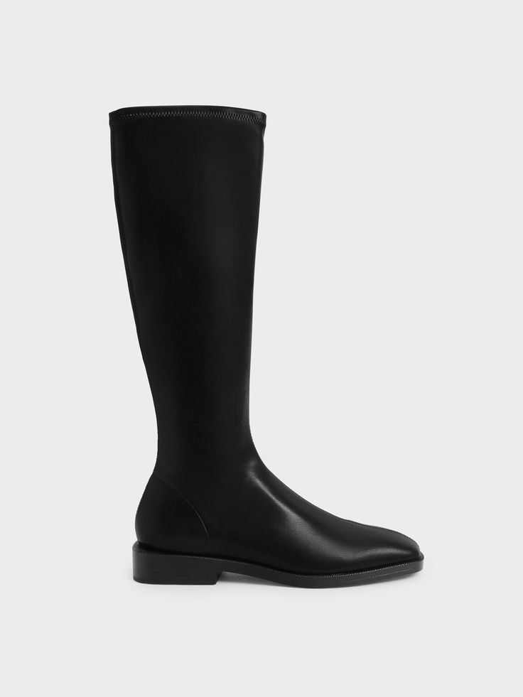 It is never too late to get yourself a pair of knee-high boots, and these could be the one for you. With their sleek black colour, you can trust them to quietly slot into any ensemble to boost your style without disrupting what you already have going on. Plus, the square toe design is easy on the eyes and the 2.5cm low heel is perfect for all-day walks. For an elegant ensemble, style them with a shirt dress and a saddle bag. Knee High Flat Boots, High Flat Boots, Knee High Boots Outfit, Black Flat Boots, Knee High Boots Flat, High Boots Outfit, Toes Designs, Faux Leather Heels, Black Knees