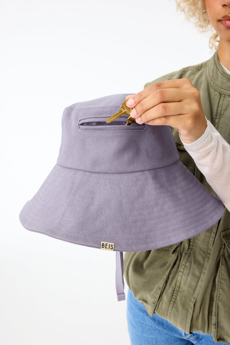 Sun protection is always in style… and so is a good bucket hat (you heard it here first, folks). Channel your inner travel dad with our machine-washable cotton hat created to match back perfectly to your bags. Cotton Brimmed Bucket Hat For Travel, Reversible Cotton Hat For Everyday, Cotton Bucket Hat For Travel, Travel Cotton Sun Hat With Curved Brim, Cotton Sun Hat With Curved Brim For Travel, Cotton Travel Sun Hat With Curved Brim, Cotton Brimmed Sun Hat For Travel, Adjustable Cotton Sun Hat For Travel, Cotton Bucket Hat With Upf 50+ For Everyday