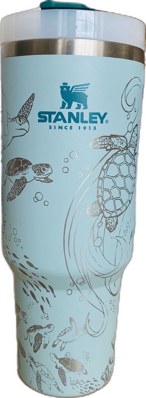 the tumbler cup has an image of sea turtles on it