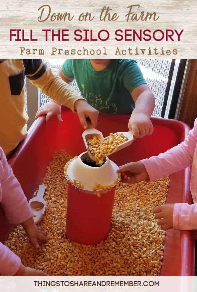 three children are playing with a red bucket filled with popcorn and the words down on the farm fill the silo sensory